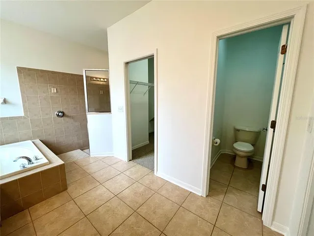 a bathroom with a sink and shower