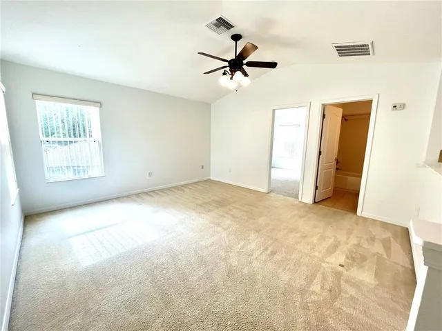 an empty room with a bathroom