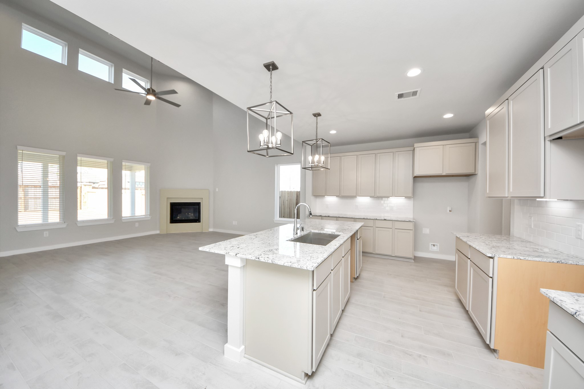 2922 Burris Park Drive Spring, TX 77373 - Photo 11 of 37 All of this overlooks your expansive family room, creating a perfect space for culinary delights and family gatherings. Sample photo of completed home with similar floor plan. Actual colors and selections may vary.
