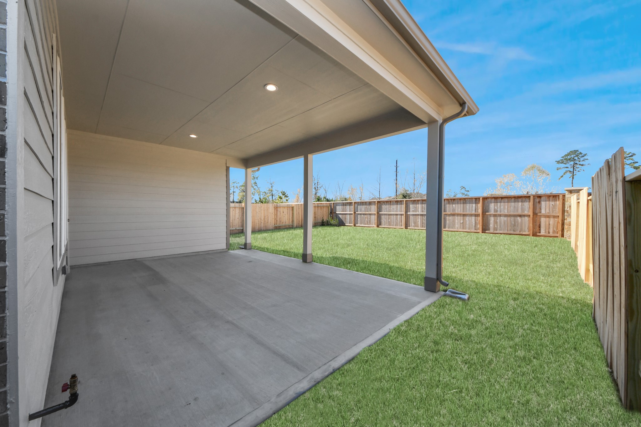 2922 Burris Park Drive Spring, TX 77373 - Photo 37 of 37 Come and see this spacious backyard with its beautiful covered patio. There is plenty of room for the kids to play and adults to relax. Perfect for your outdoor living space, patio furniture, bbq pit, and so much more. The possibilities are endless! Sample photo of completed home with similar floor plan. Actual colors and selections may vary.
