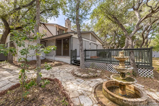 a backyard of a house with lots of green space