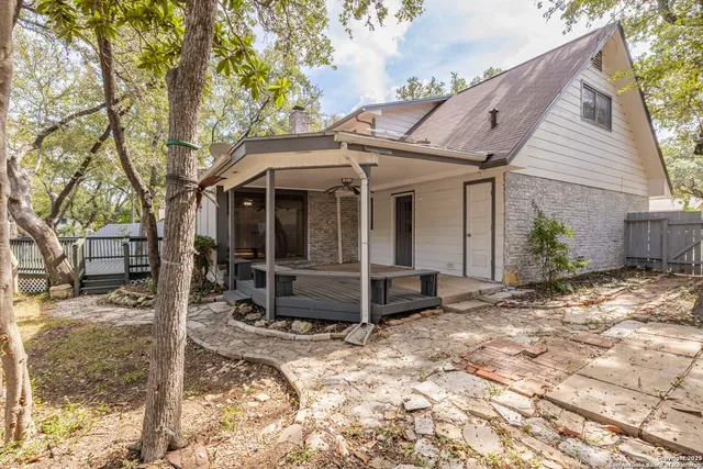 a view of a playground with a tree