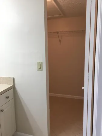 a view of city and mountain from a balcony