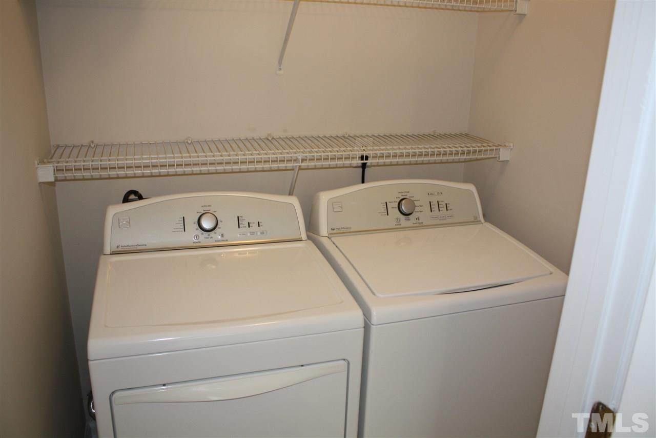 8912 Shallcross Way Raleigh, NC 27617 - Photo 17 of 20 a close up view of washer and dryer with washer and dryer