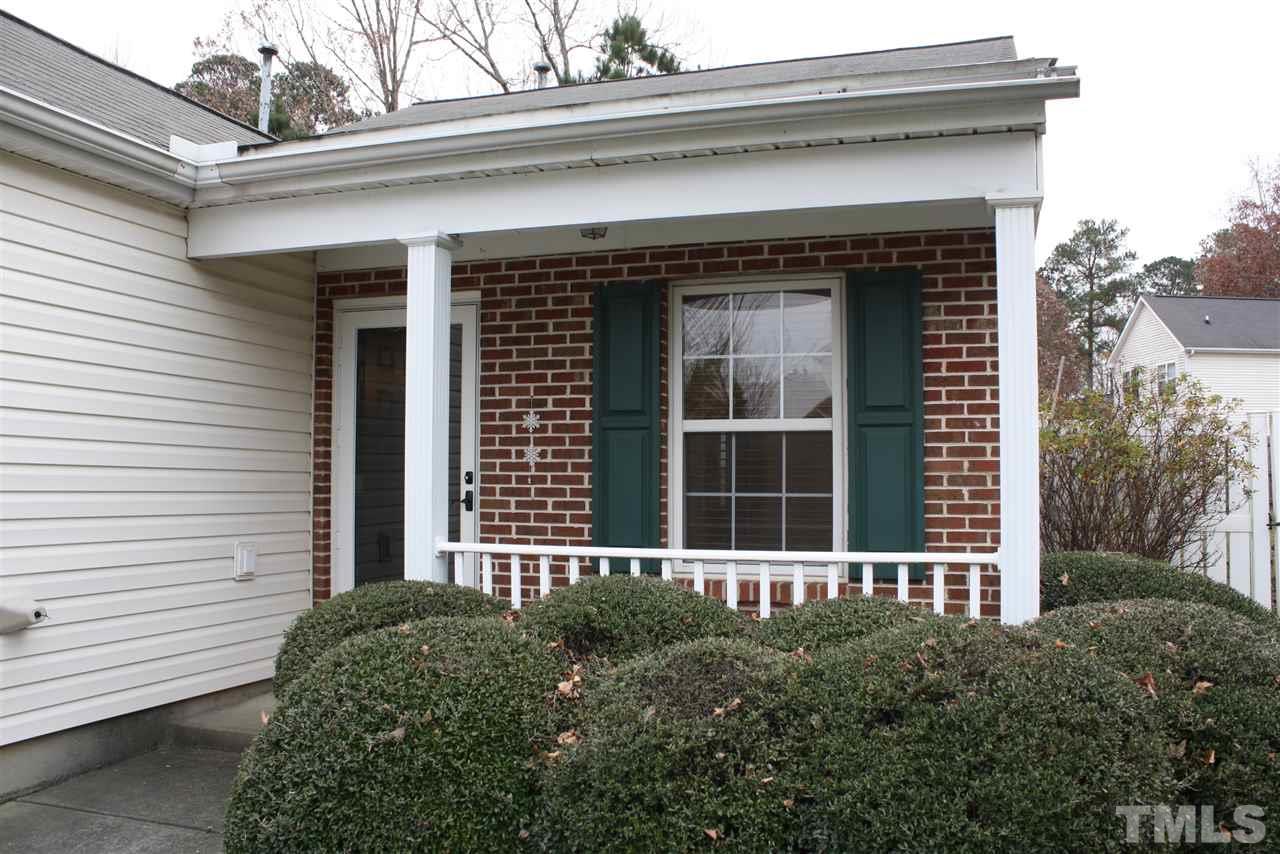 8912 Shallcross Way Raleigh, NC 27617 - Photo 5 of 20 a front view of a house with a yard