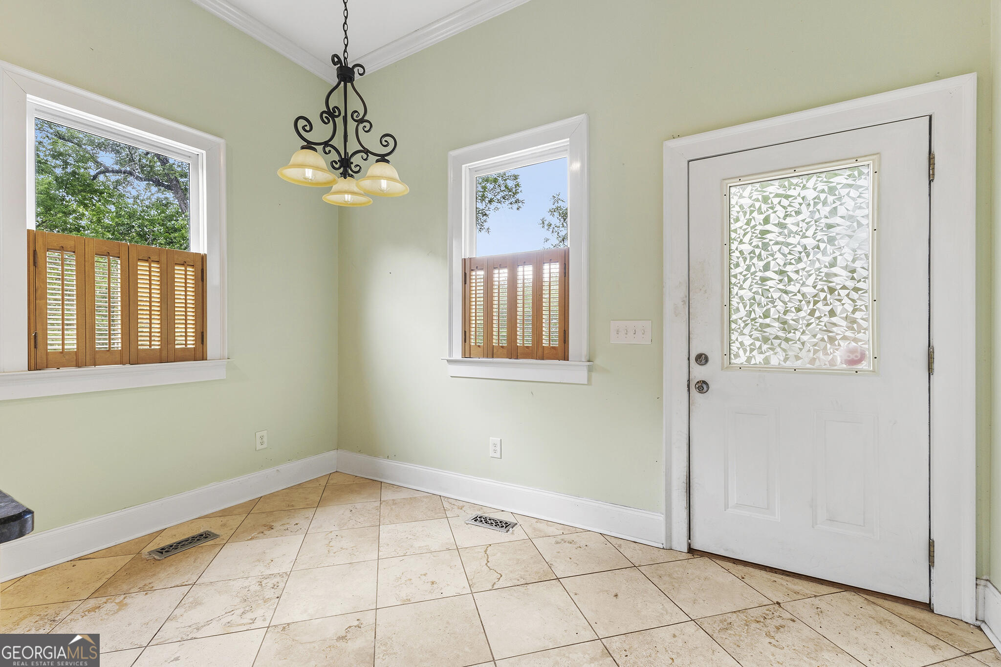 1469 Chestnut Street Macon, GA 31201 - Photo 22 of 26 a view of an empty room with window