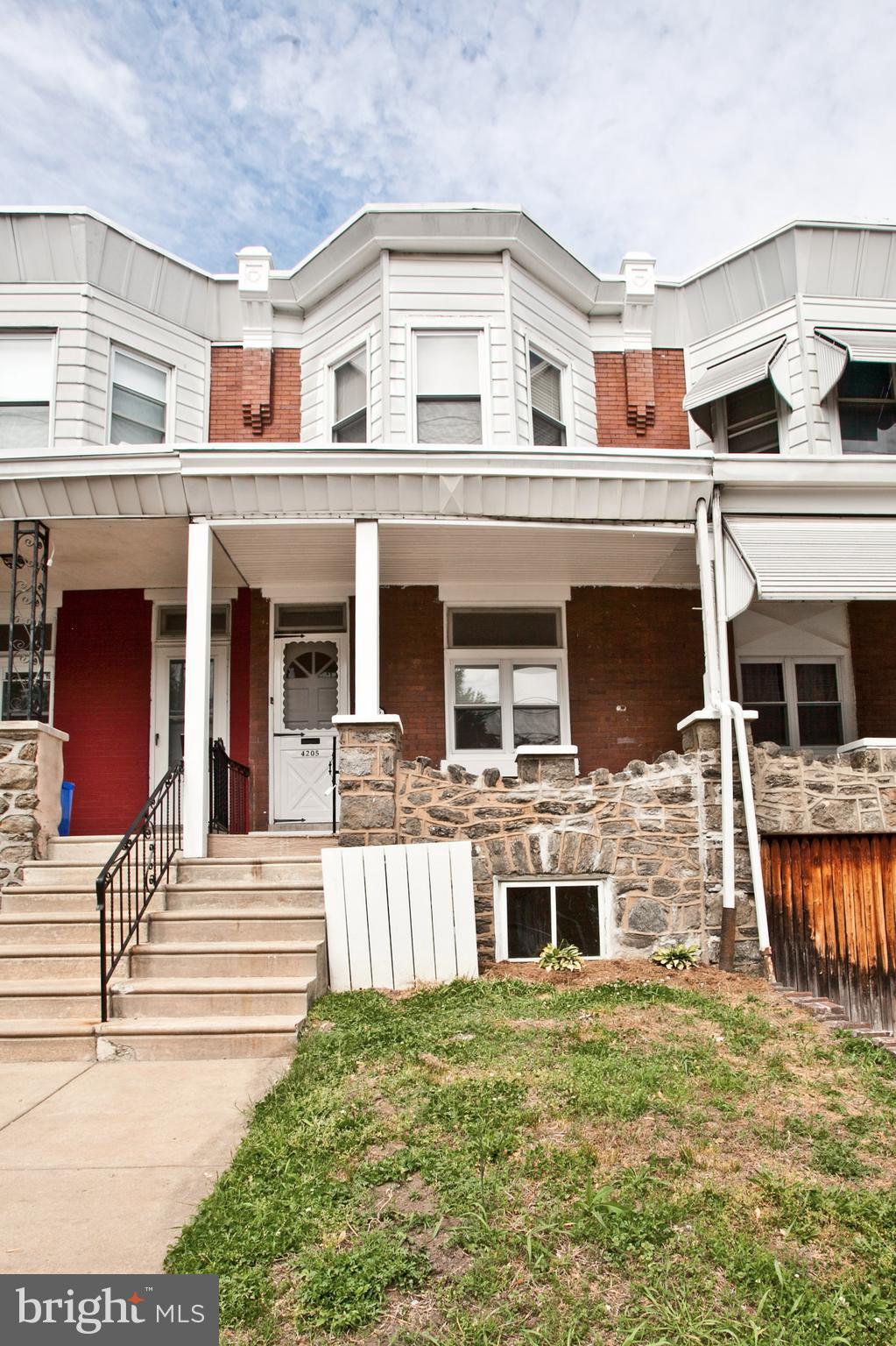 4205 Terrace Street Philadelphia, PA 19128 - Photo 1 of 30 a front view of a house with a yard