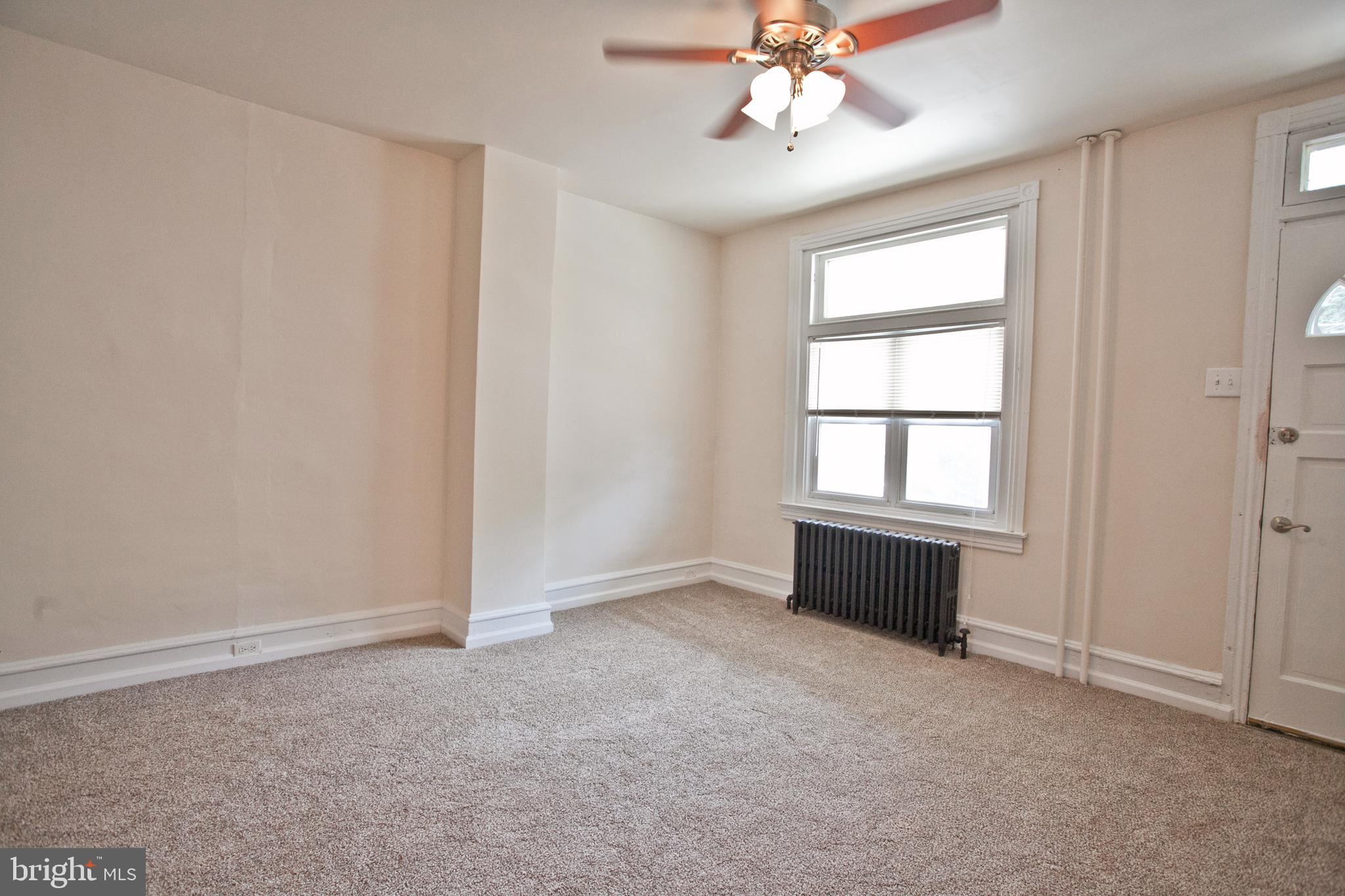4205 Terrace Street Philadelphia, PA 19128 - Photo 11 of 30 an empty room with windows and fan