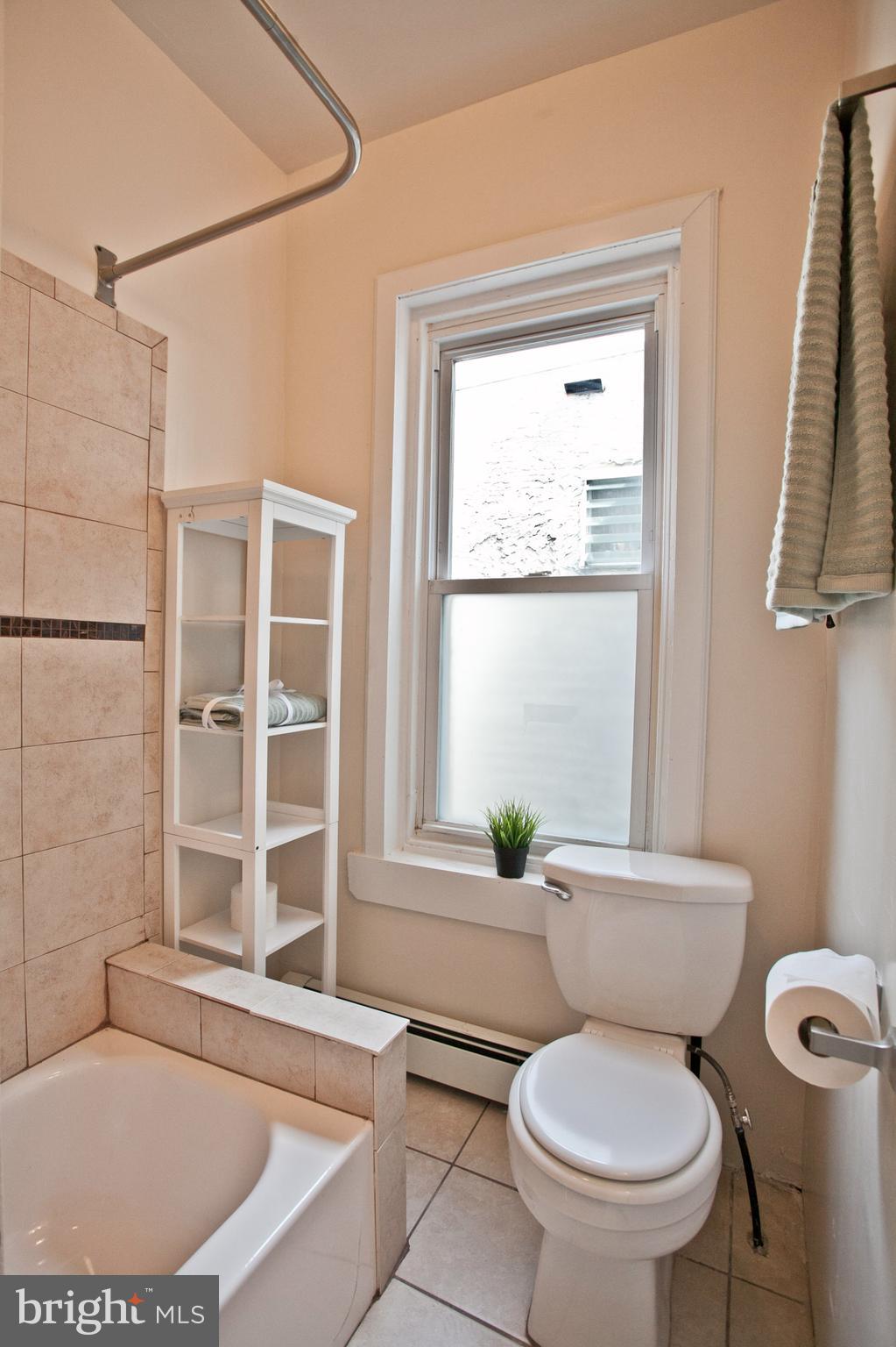 4205 Terrace Street Philadelphia, PA 19128 - Photo 17 of 30 a bathroom with a toilet and a shower
