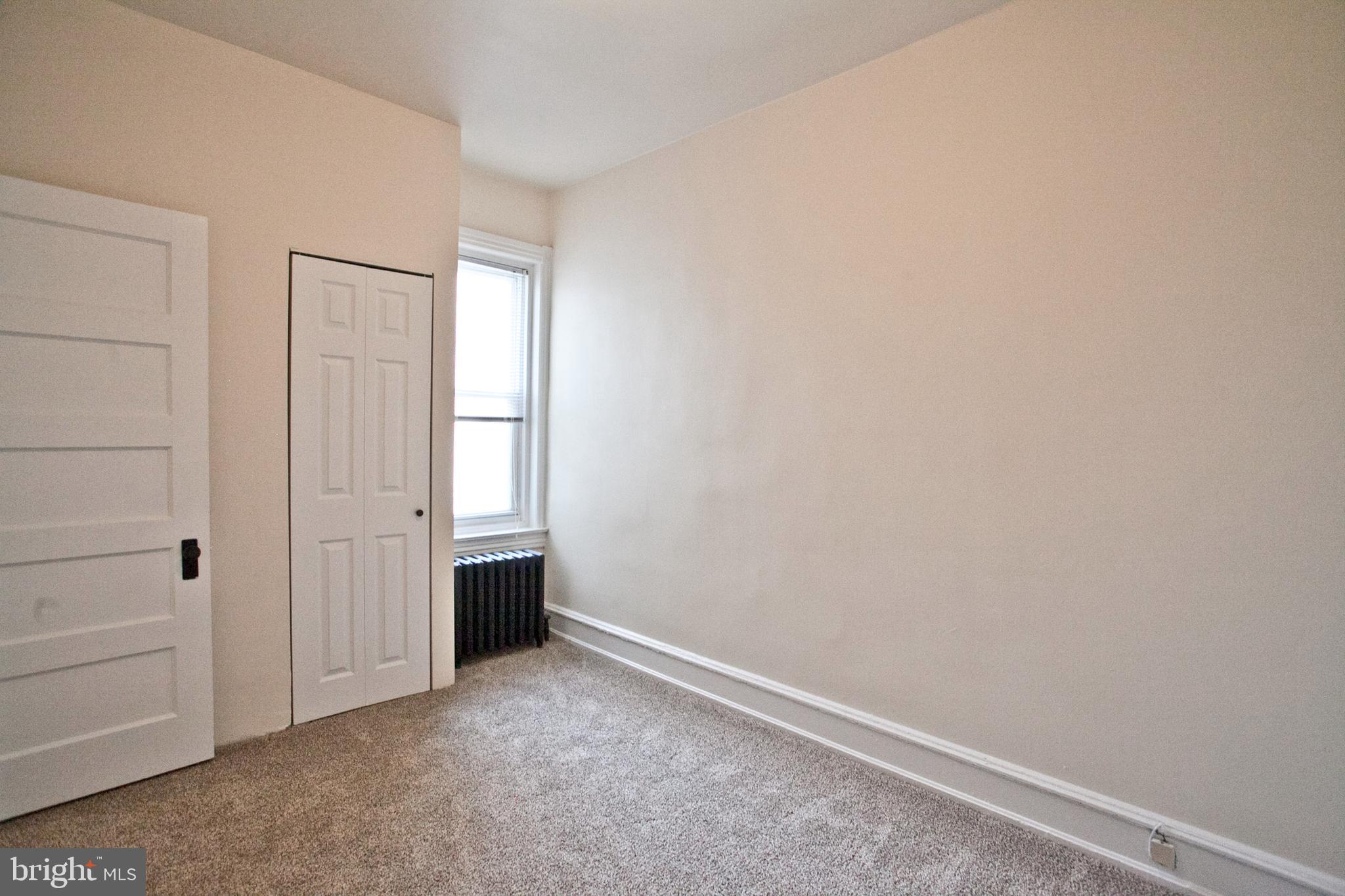 4205 Terrace Street Philadelphia, PA 19128 - Photo 19 of 30 a view of an empty room with closet and a window