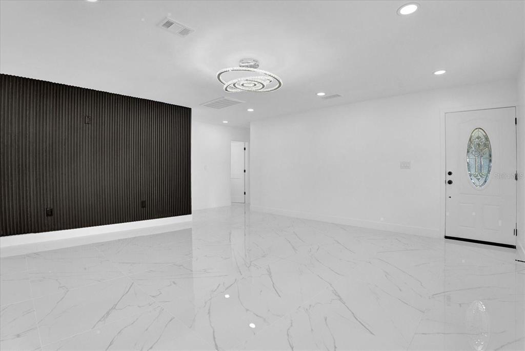 201 Massachusetts Avenue St. Cloud, FL 34769 - Photo 12 of 33 an empty room with fan