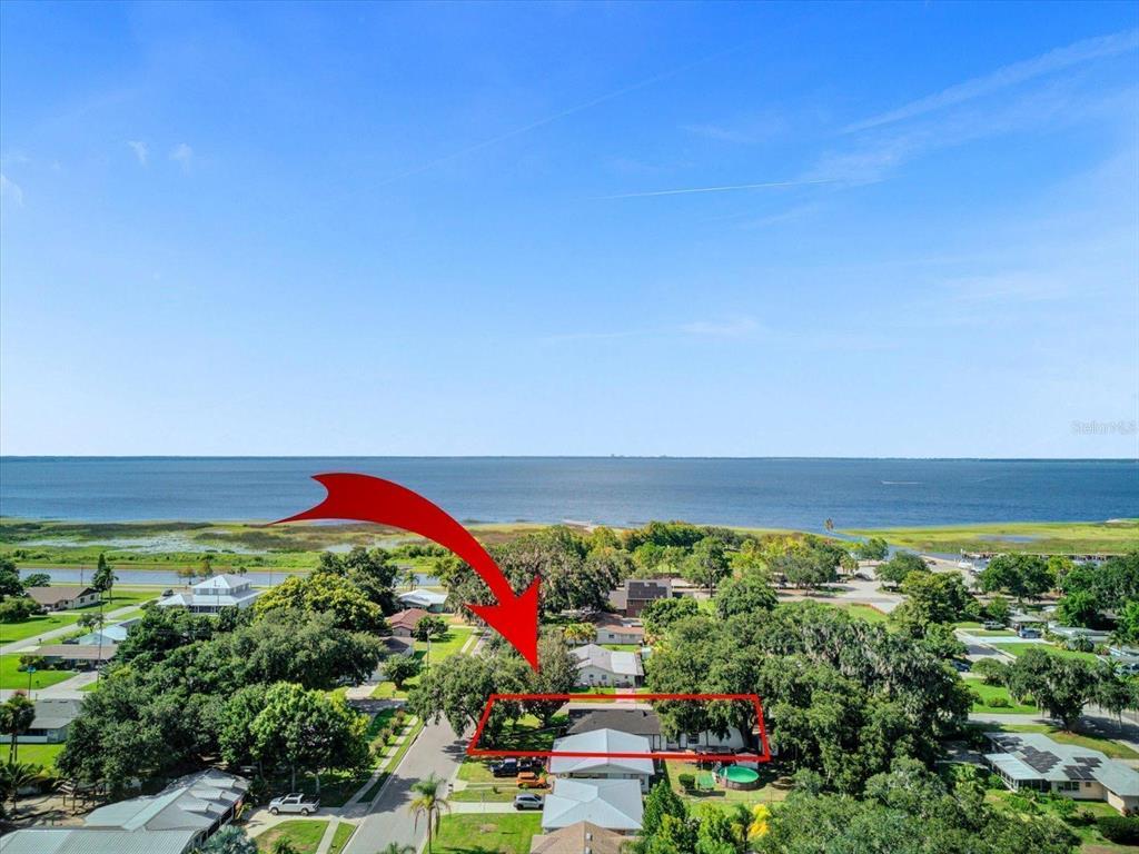 201 Massachusetts Avenue St. Cloud, FL 34769 - Photo 2 of 33 a view of a flower in a yard