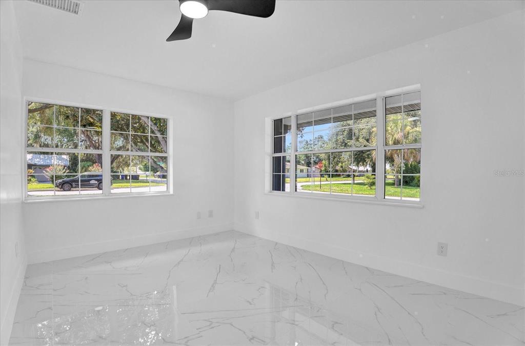 201 Massachusetts Avenue St. Cloud, FL 34769 - Photo 28 of 33 a view of an empty room with a window