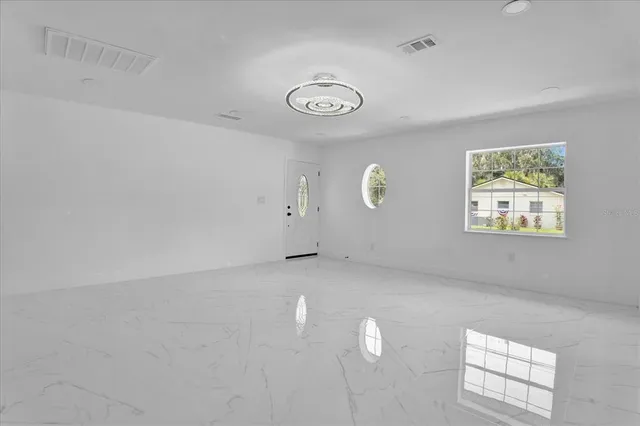 an empty room with windows