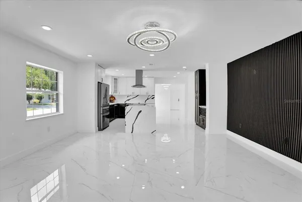 a view of a kitchen and a window