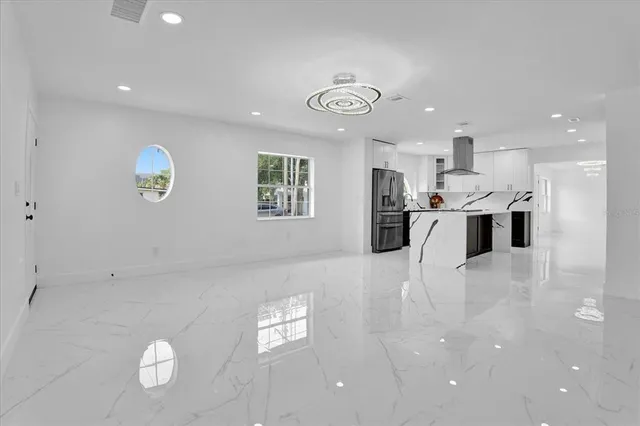 a view of kitchen and windows