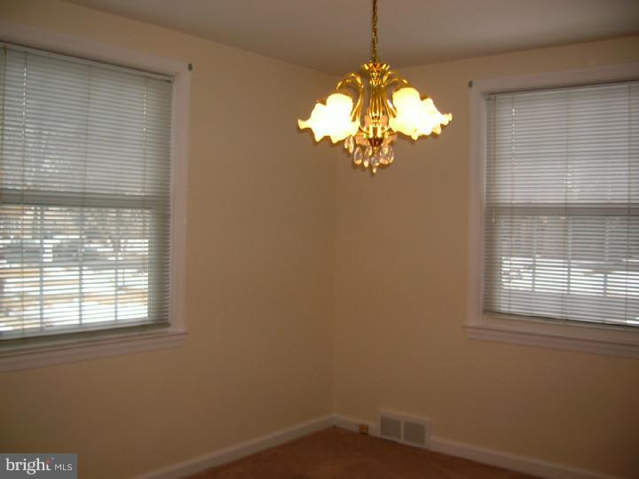 328 Lynn Road Springfield, PA 19064 - Photo 3 of 16 a view of a chandelier in a room