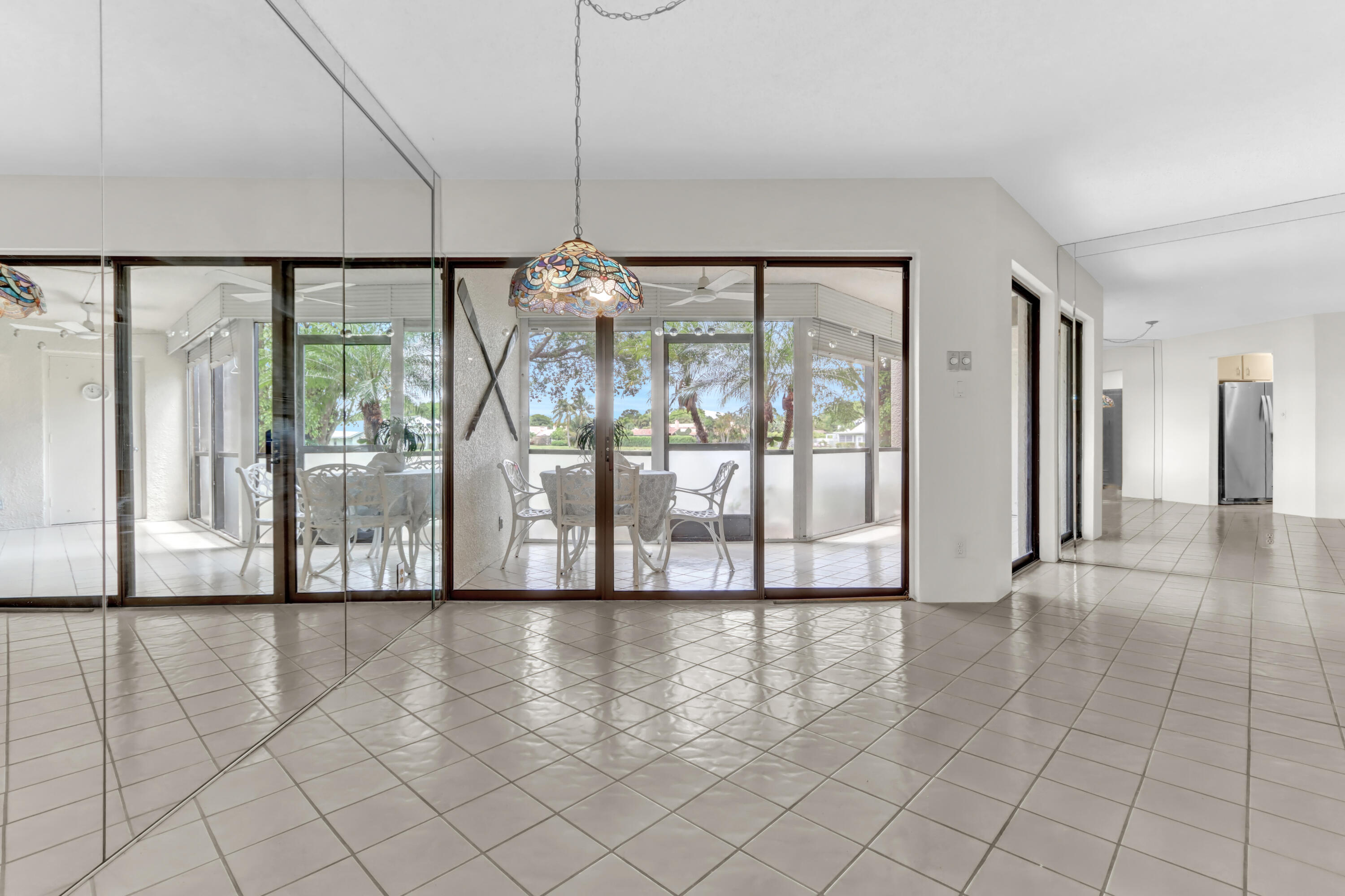 5800 Camino Del Sol, Unit 103 Boca Raton, FL 33433 - Photo 6 of 28 DINING ROOM/LIVING ROOM