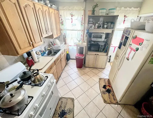 a bedroom with a bed and dresser