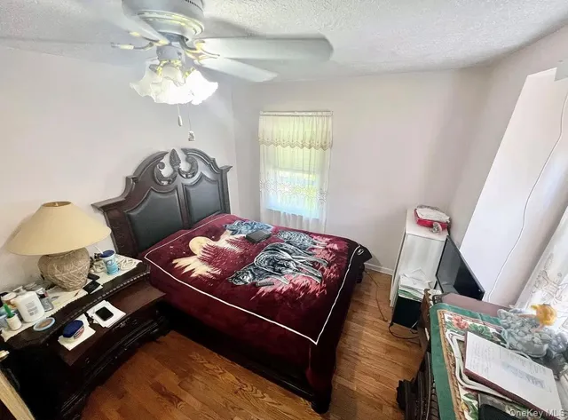 a bathroom with a sink toilet and mirror