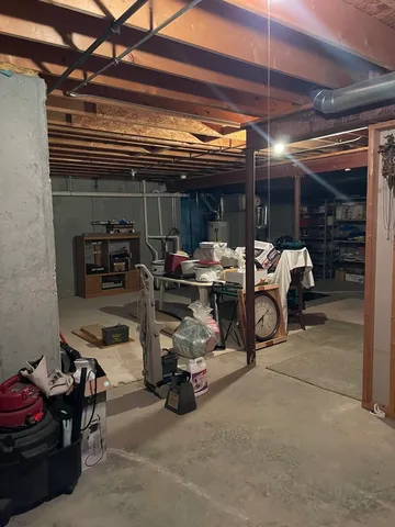 a bed room with a bed and a table