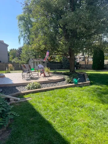 a view of a park with swings and slides