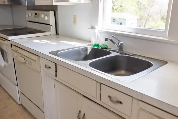 a view of storage and utility room with washer and dryer
