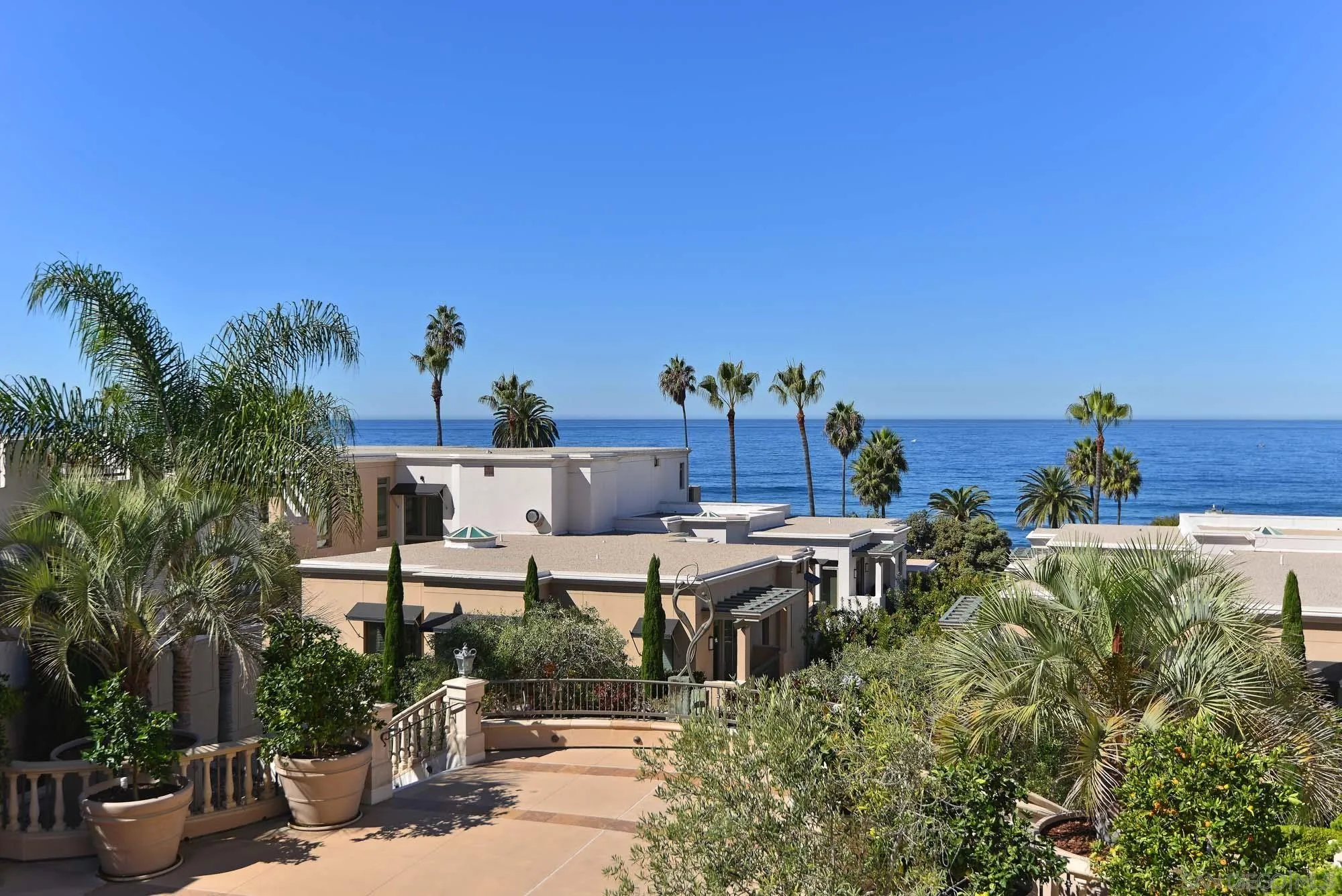 464 Prospect Street, Unit 101 La Jolla, CA 92037 - Photo 27 of 43 a view of a terrace with sitting area