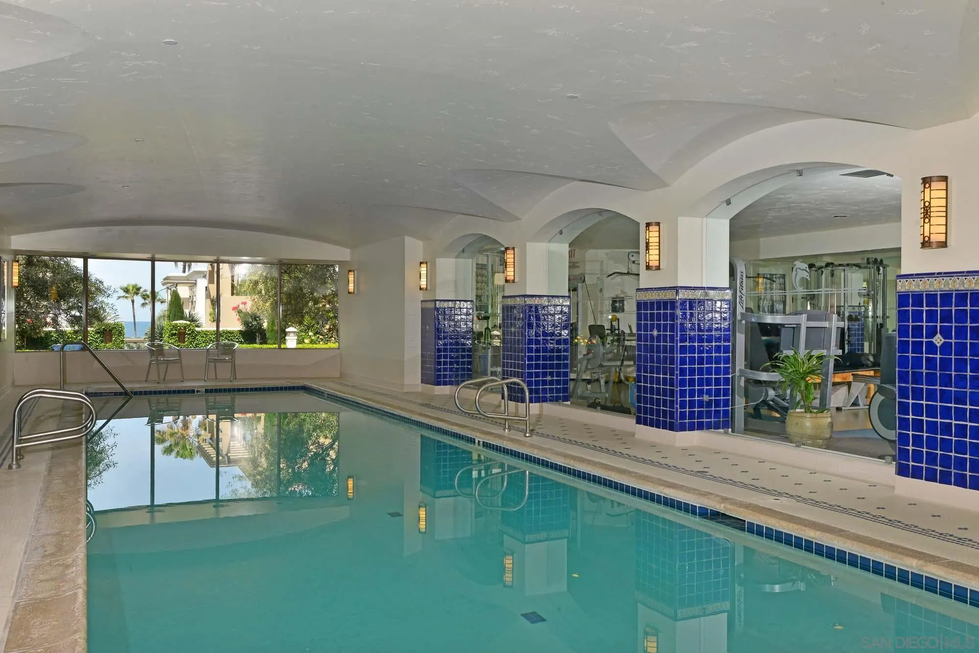 464 Prospect Street, Unit 101 La Jolla, CA 92037 - Photo 34 of 43 a view of swimming pool with a outdoor seating