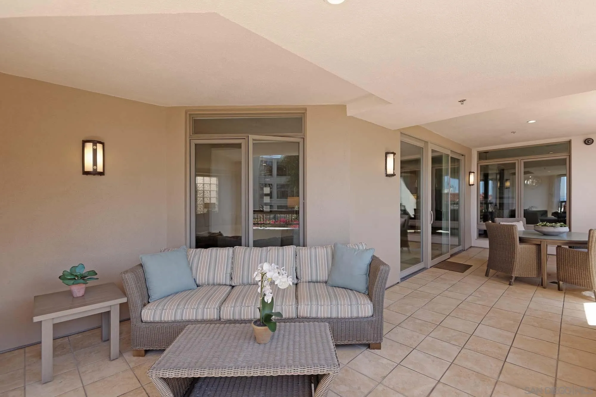 464 Prospect Street, Unit 101 La Jolla, CA 92037 - Photo 9 of 43 a living room with furniture and a couch