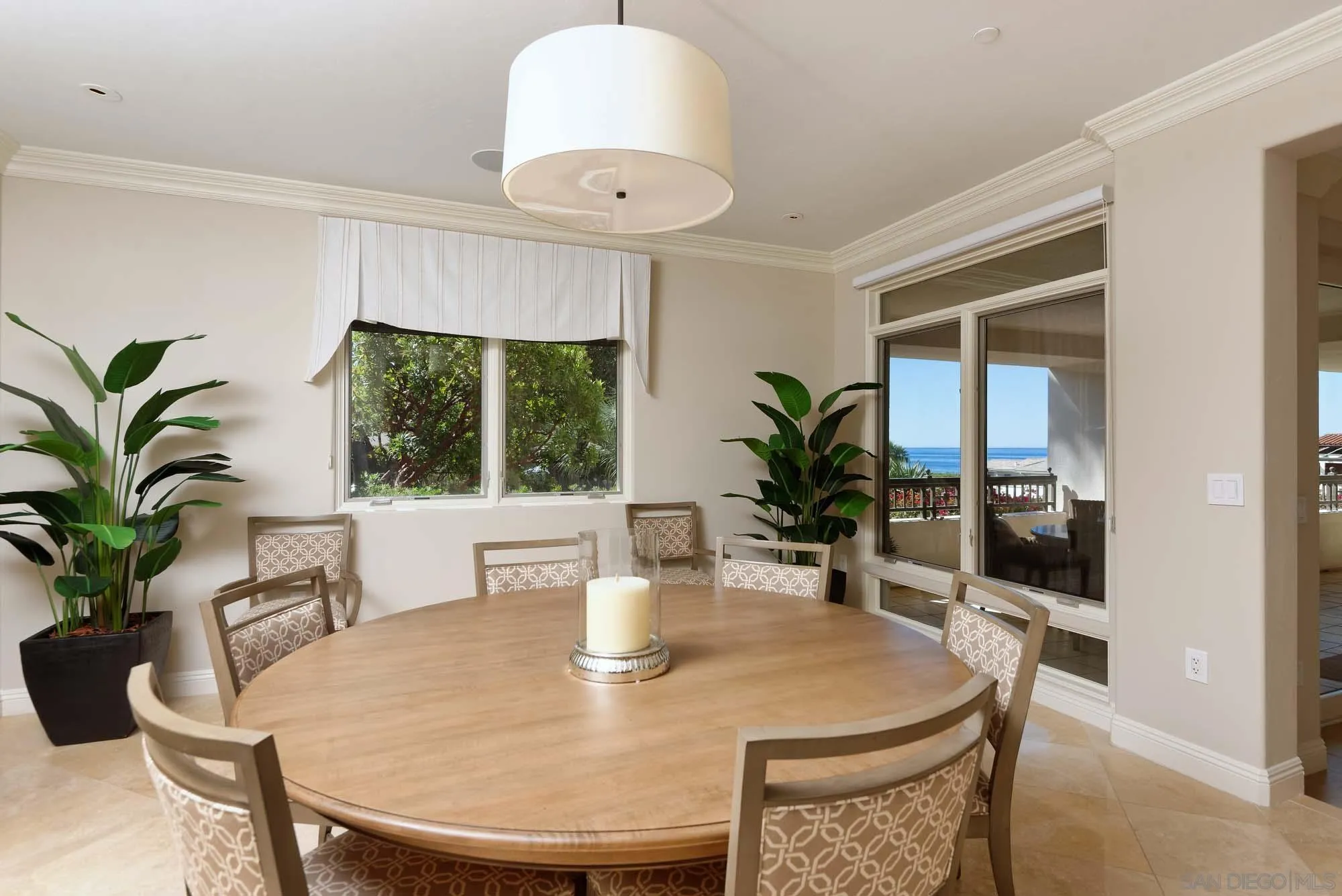 464 Prospect Street, Unit 101 La Jolla, CA 92037 - Photo 10 of 43 a dining room with furniture and window