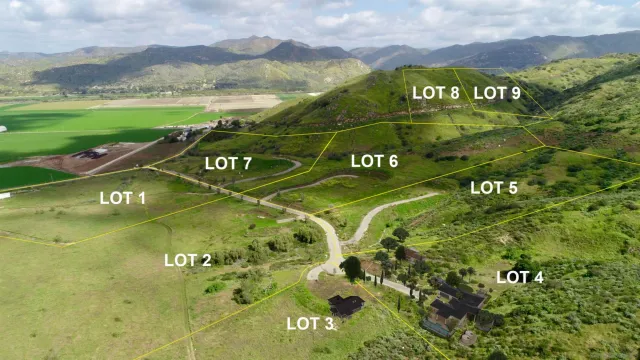 a view of a park with an ocean view