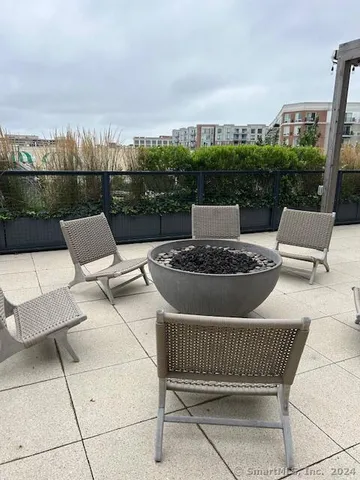 a view of a terrace with furniture