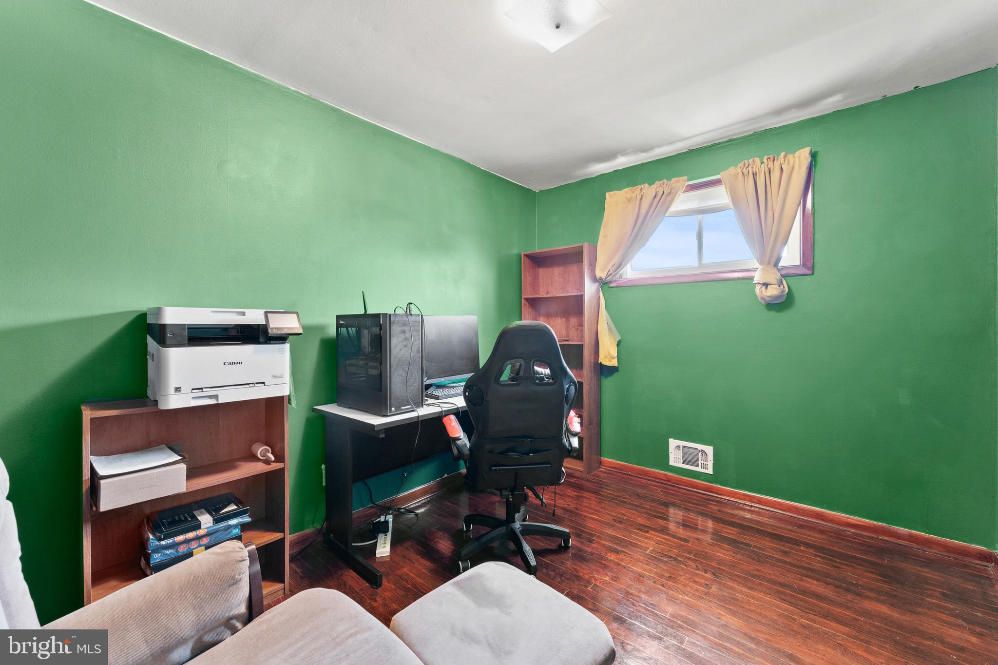 8426 Avery Road Baltimore, MD 21237 - Photo 19 of 25 a room with furniture and a window