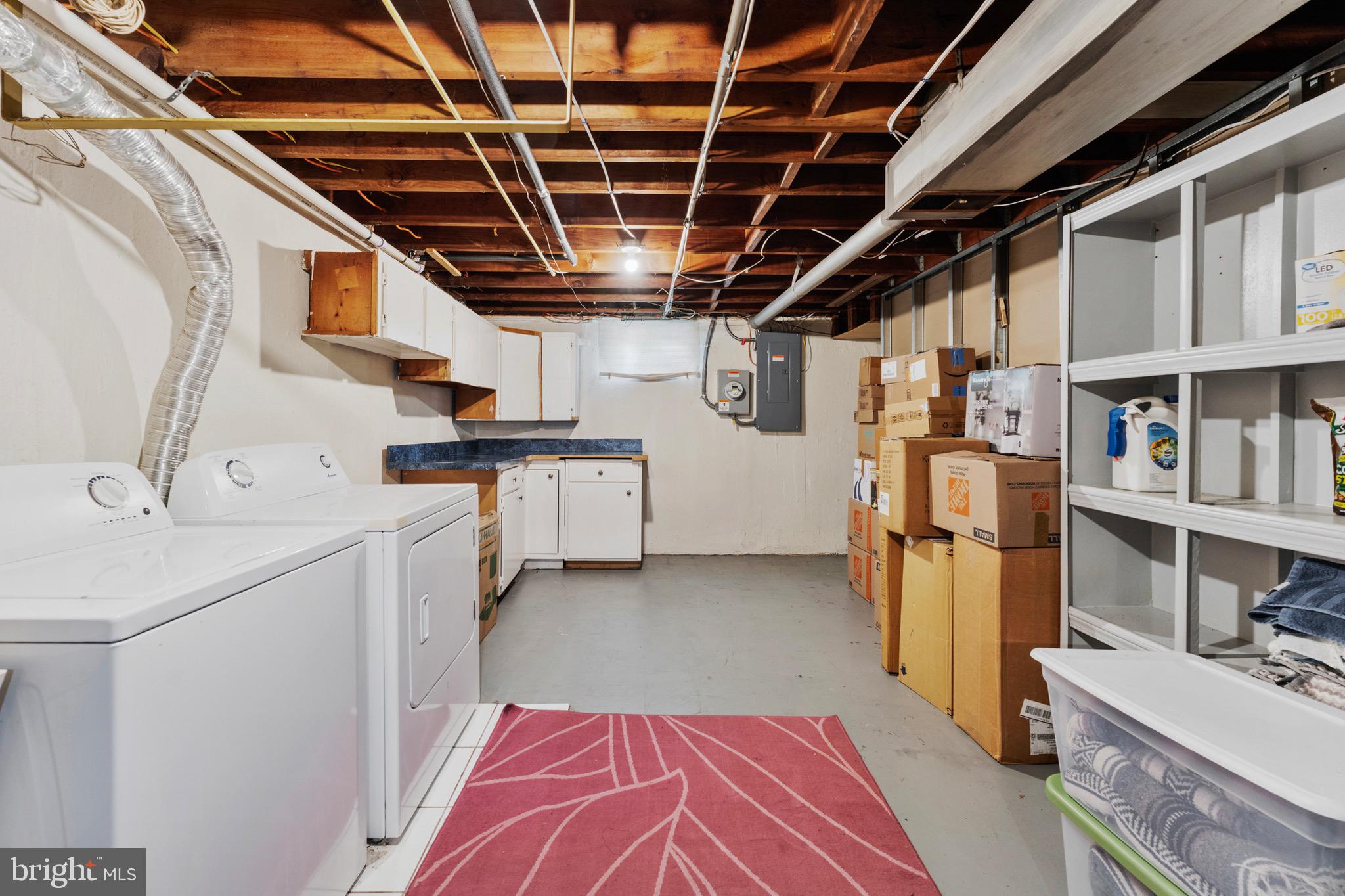8426 Avery Road Baltimore, MD 21237 - Photo 23 of 25 a storage room with cabinets