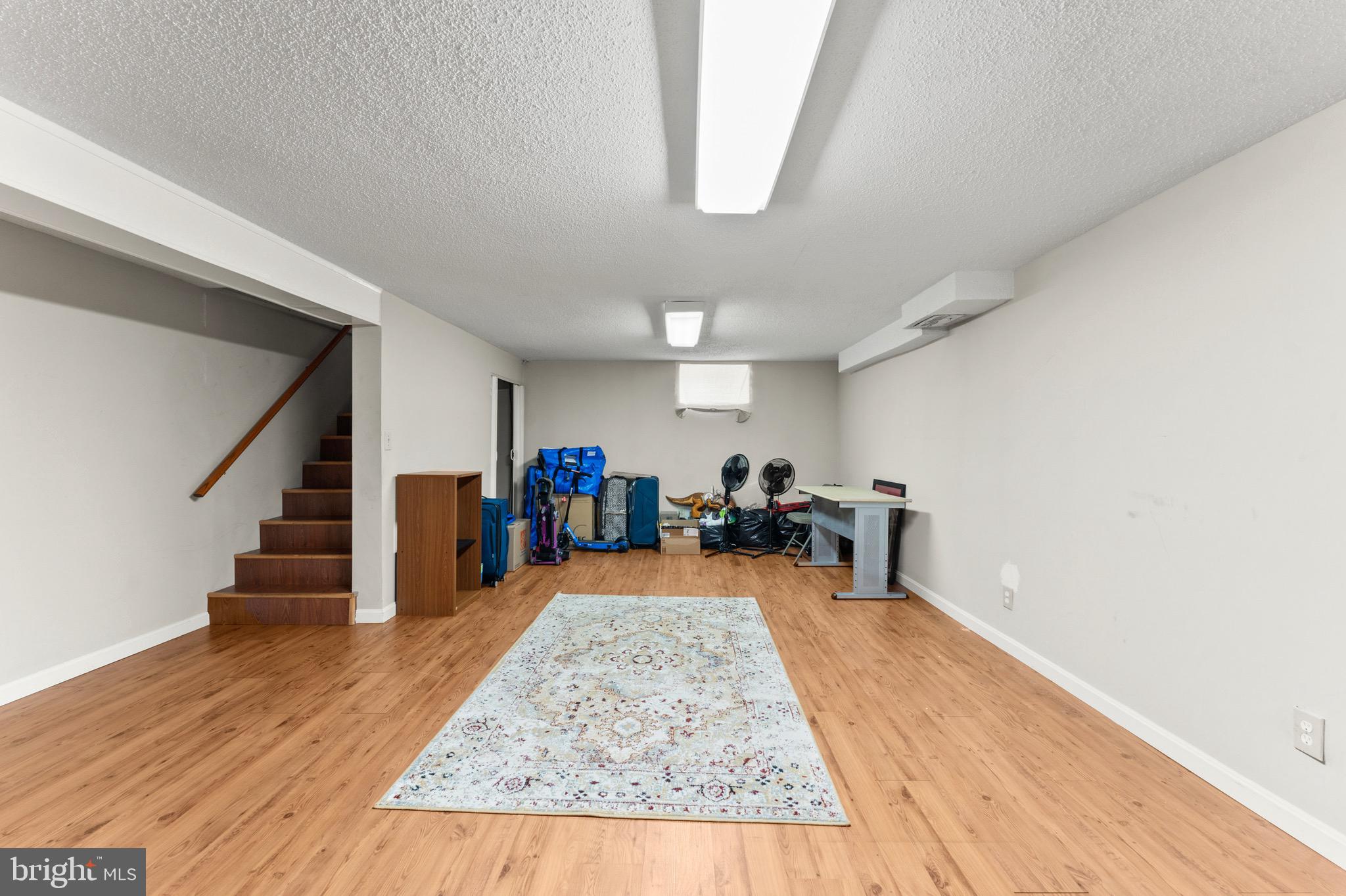 8426 Avery Road Baltimore, MD 21237 - Photo 25 of 25 a view of a livingroom with wooden floor and furniture