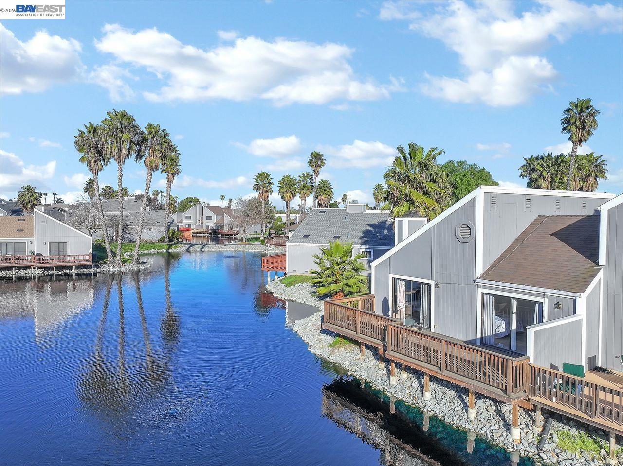 2033 Sand Point Road Discovery Bay, CA 94505 - Photo 26 of 27 a house with river in front of it