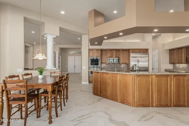 a room with furniture and a chandelier