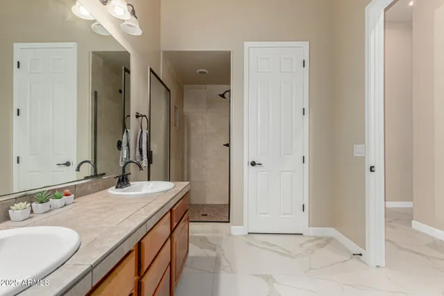 a front view of a house with swimming pool and porch