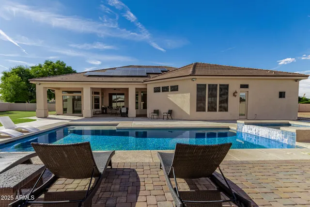 a view of a back yard of the house