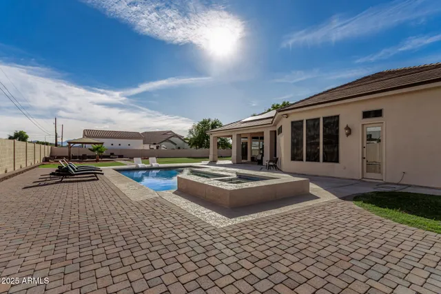 an aerial view of a house with a garden