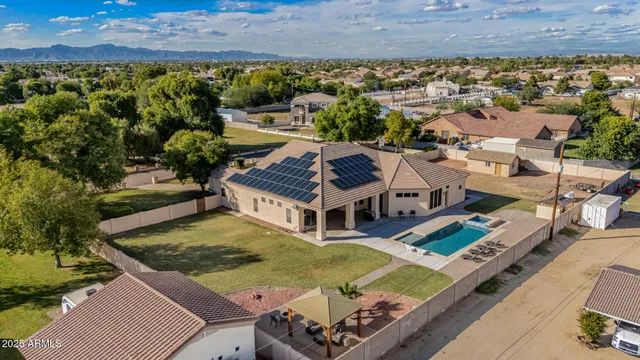a front view of house with yard and outdoor seating