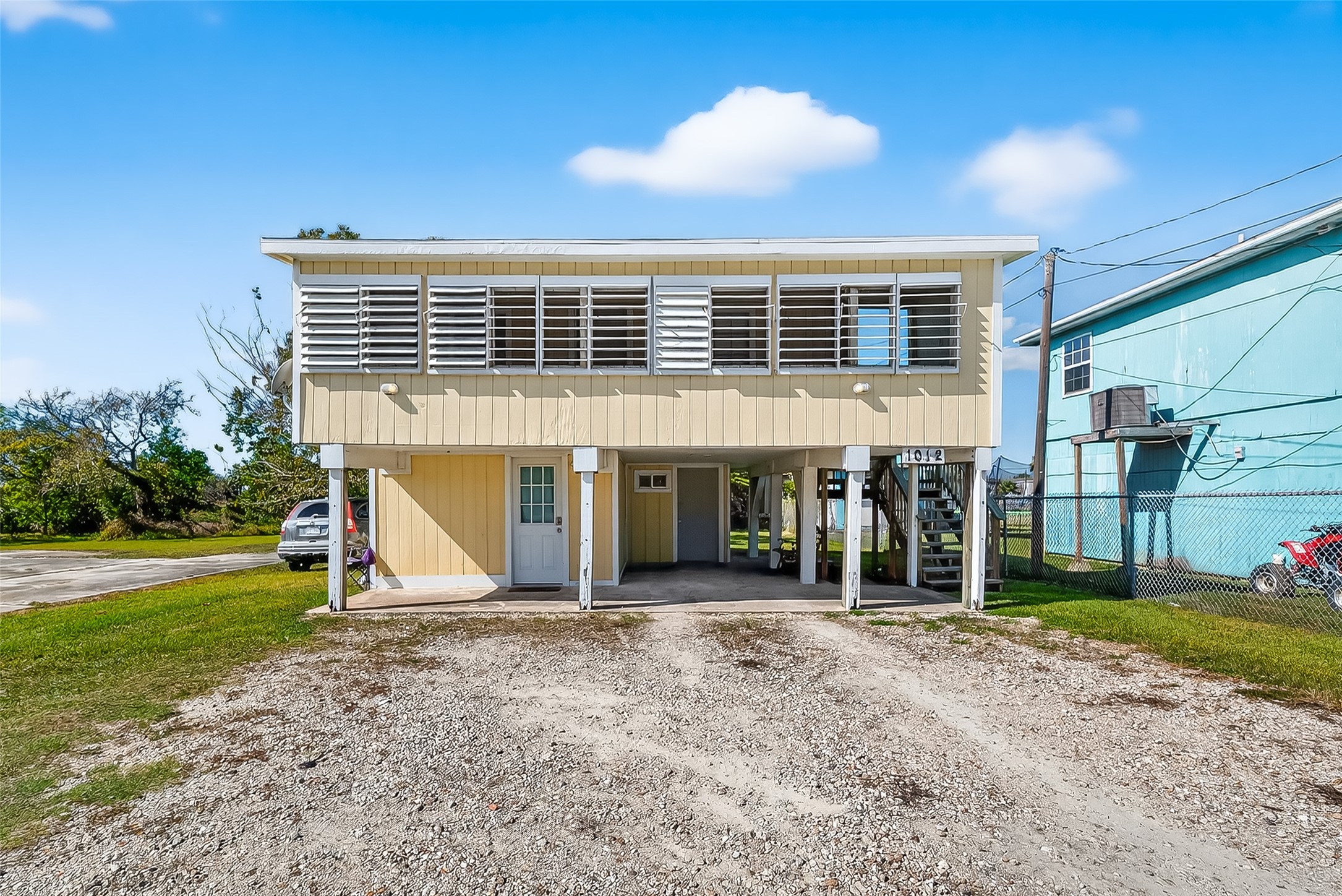 1012 12th Street, Unit UP Dickinson, TX 77539 - Photo 1 of 18 a view of a house with backyard