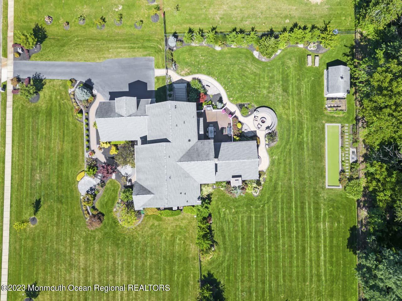 48 Weathervane Circle Cream Ridge, NJ 08514 - Photo 5 of 84 an aerial view of a house with yard swimming pool and outdoor seating