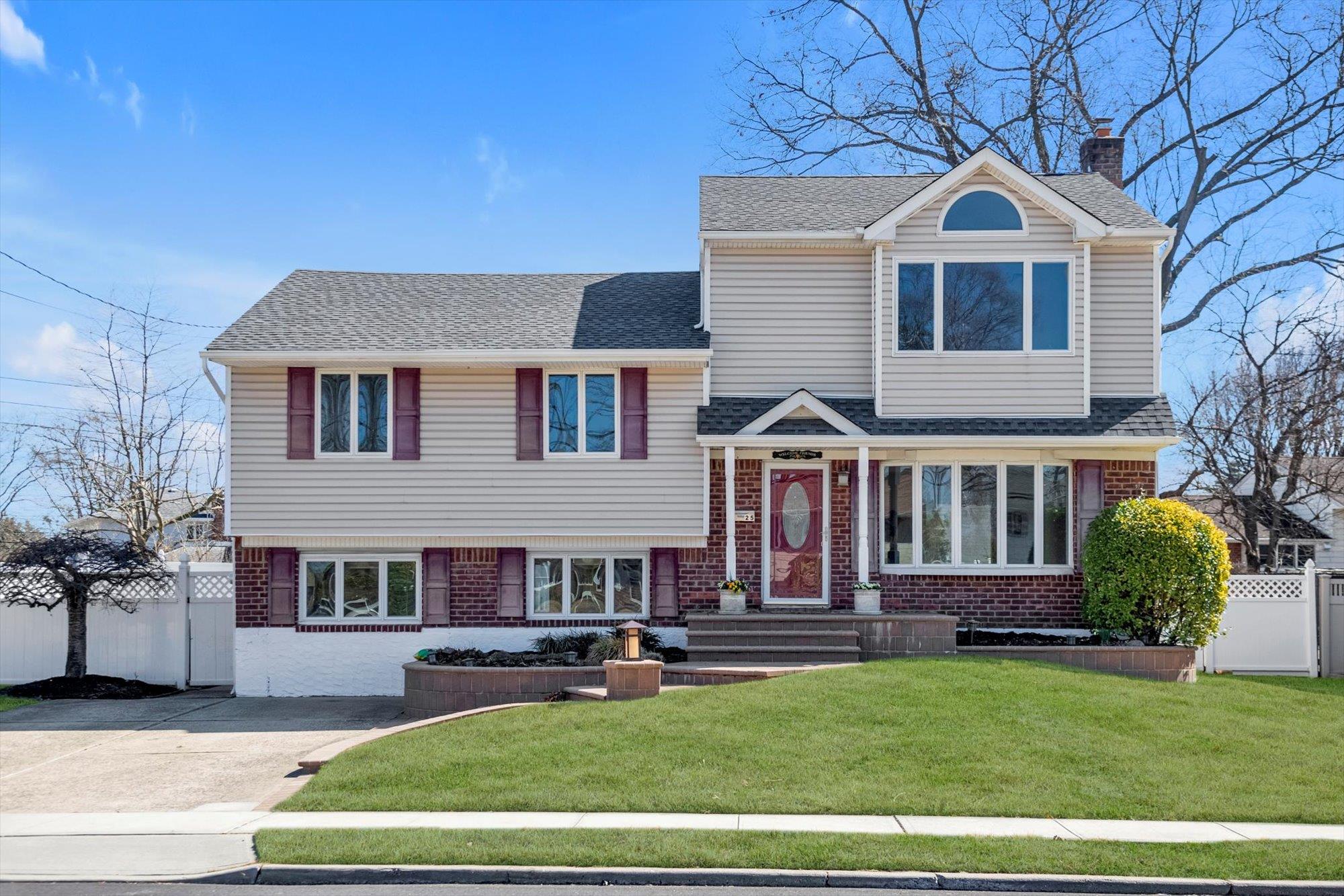 Beautiful expanded 4 bedroom, 3 bath home with mid block location