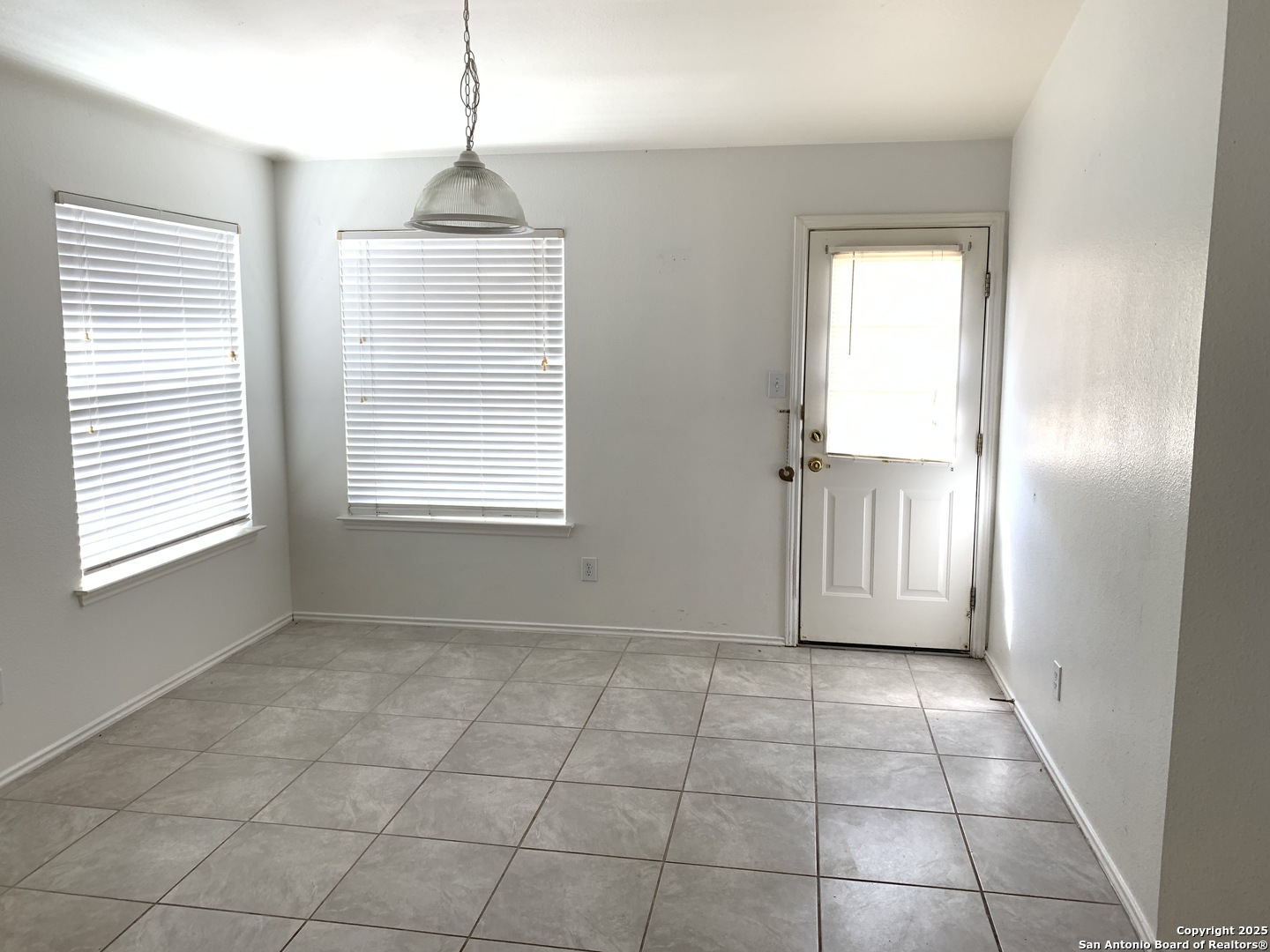 531 Rattler Bluff San Antonio, TX 78251 - Photo 12 of 36 a view of an empty room with a window