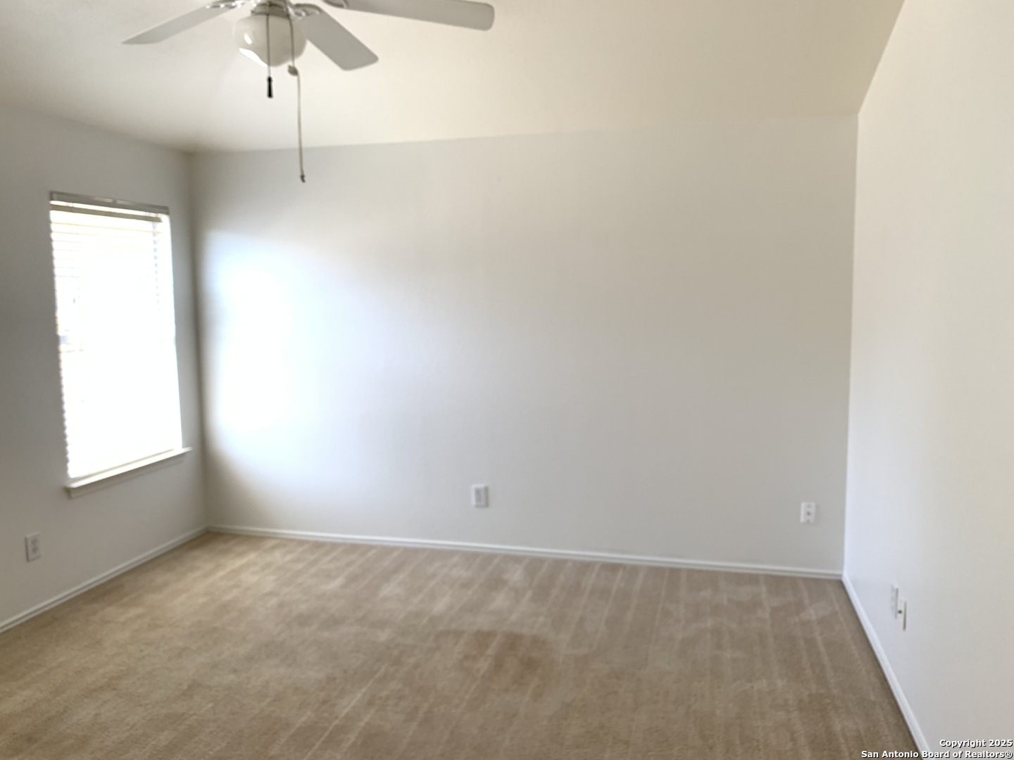 531 Rattler Bluff San Antonio, TX 78251 - Photo 14 of 36 an empty room with a window