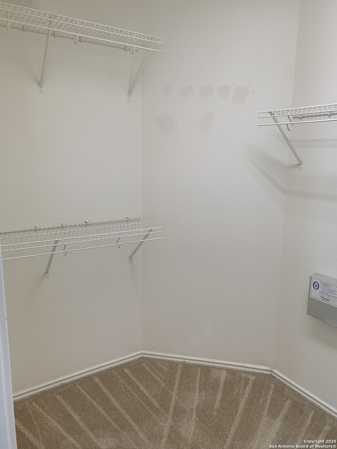 531 Rattler Bluff San Antonio, TX 78251 - Photo 16 of 36 a view of small space with racks on the wall