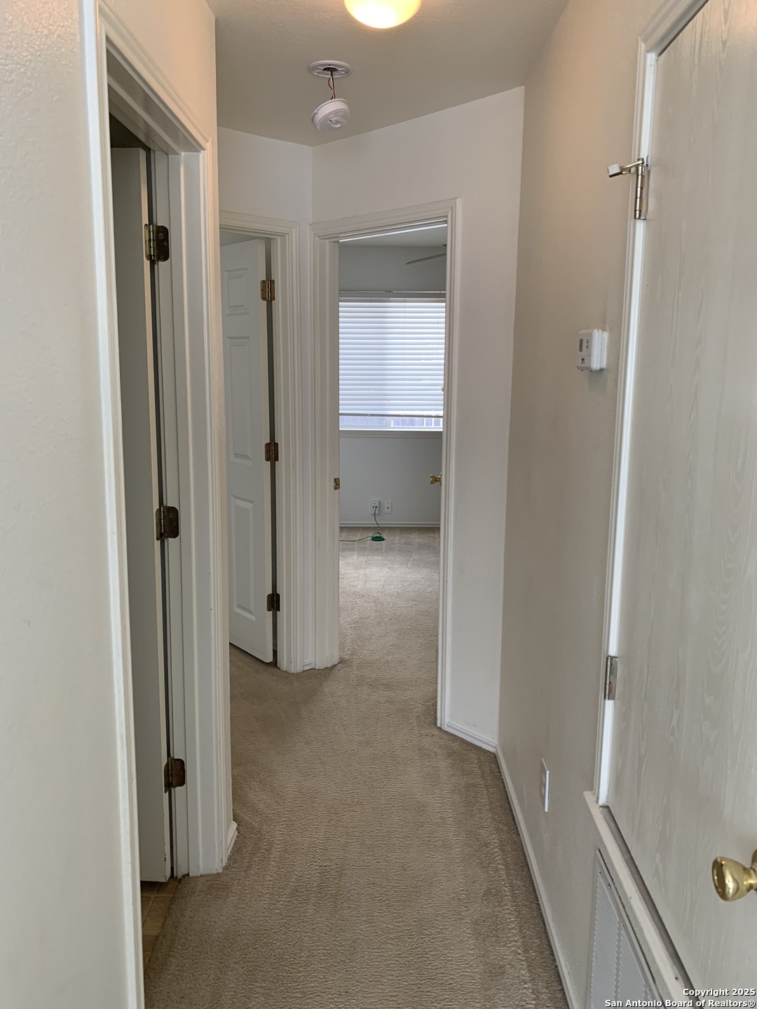 531 Rattler Bluff San Antonio, TX 78251 - Photo 24 of 36 a view of a room with white doors
