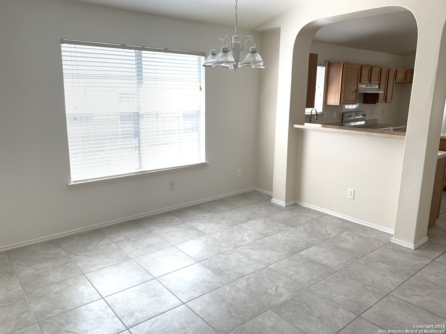 531 Rattler Bluff San Antonio, TX 78251 - Photo 7 of 36 a view of a room that has a large window and storage